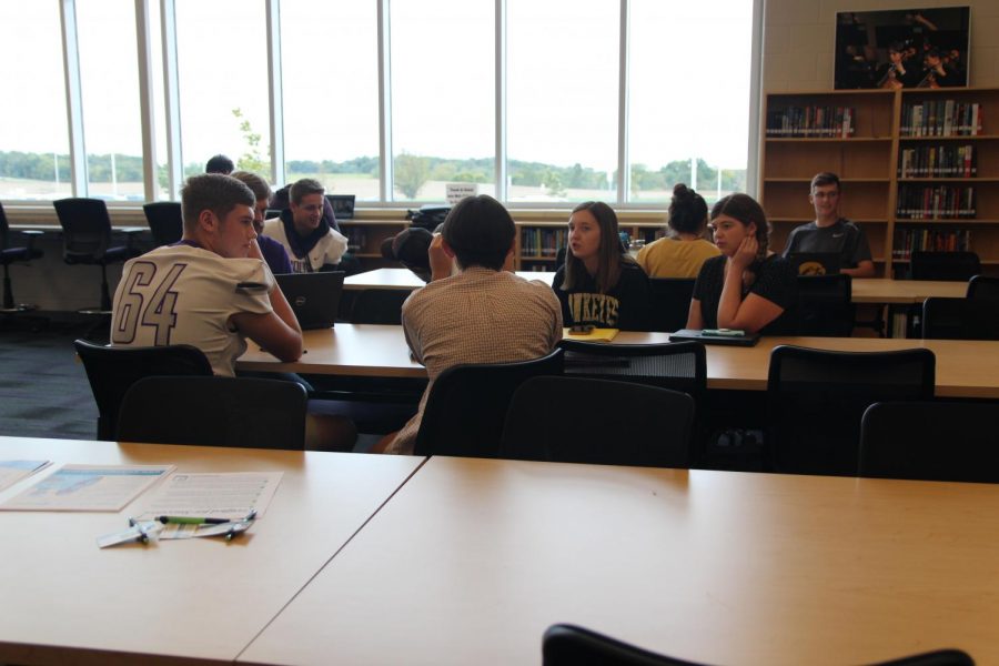 Students attending Apply Day in the Library. 