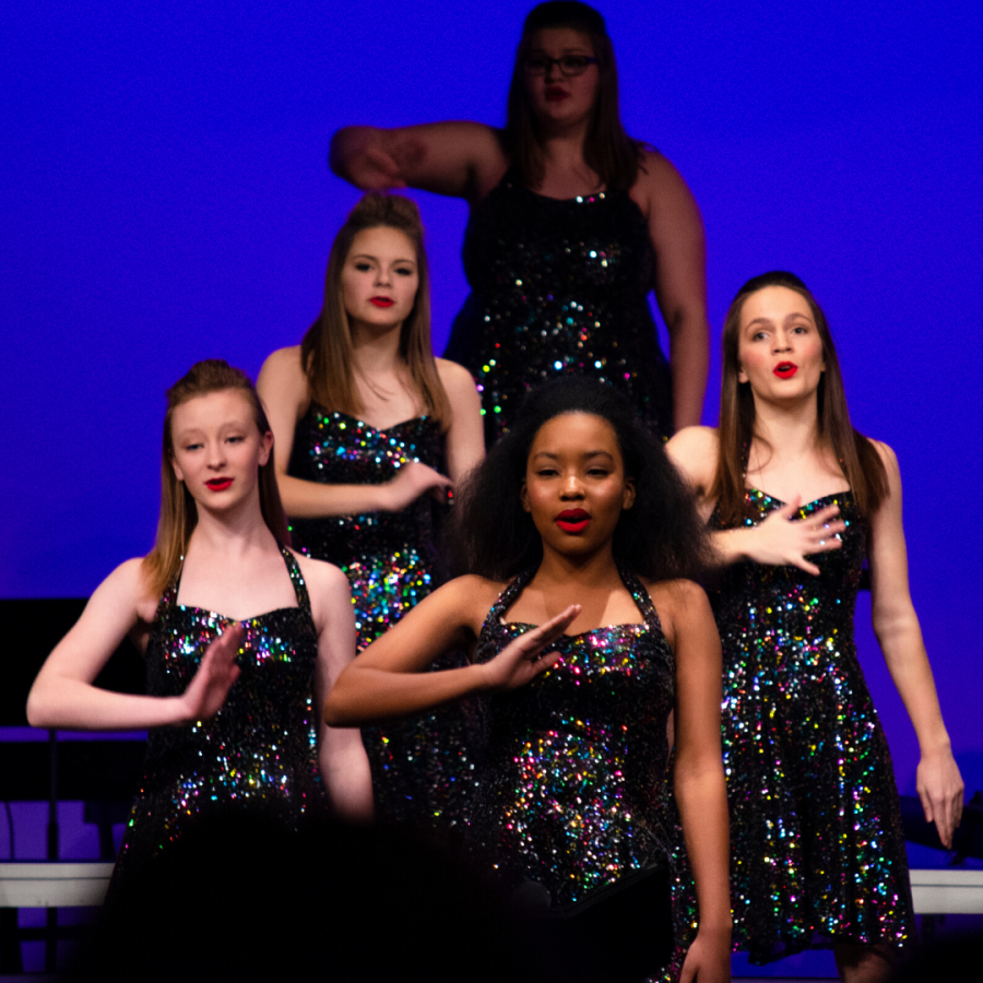 Impact, the new all girls show choir, performing at the Winter Showcase. 