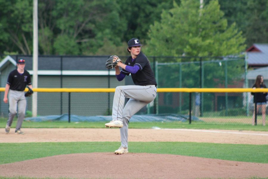 Jacob Norris pitching against Kennedy High School
