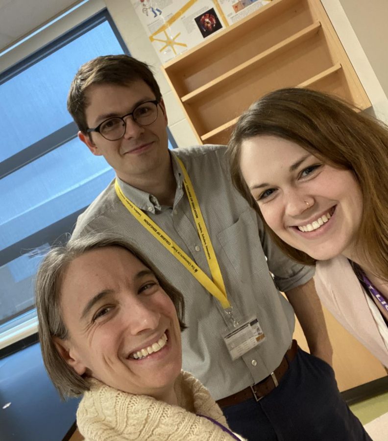 Sara Karbeling, Brooke Berringer, and Sasha Murphy pose together for a selfie in one of the physics rooms at Liberty.