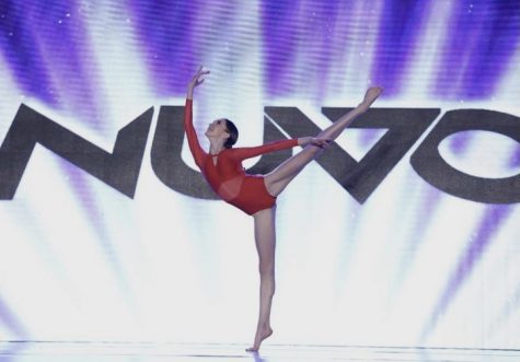 Delaine Tyler, freshman, competing her contemporary solo at Nuvo Dance Convention this year.
