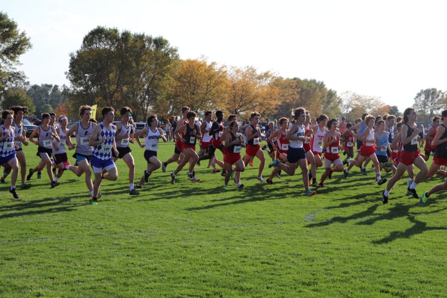 The Cross Country team racing at Iowa City Kickers course in September this year.