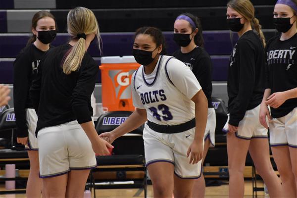 Former Liberty student and member of the girls basketball team, Keiko Ono-Fullard, getting ready to play.