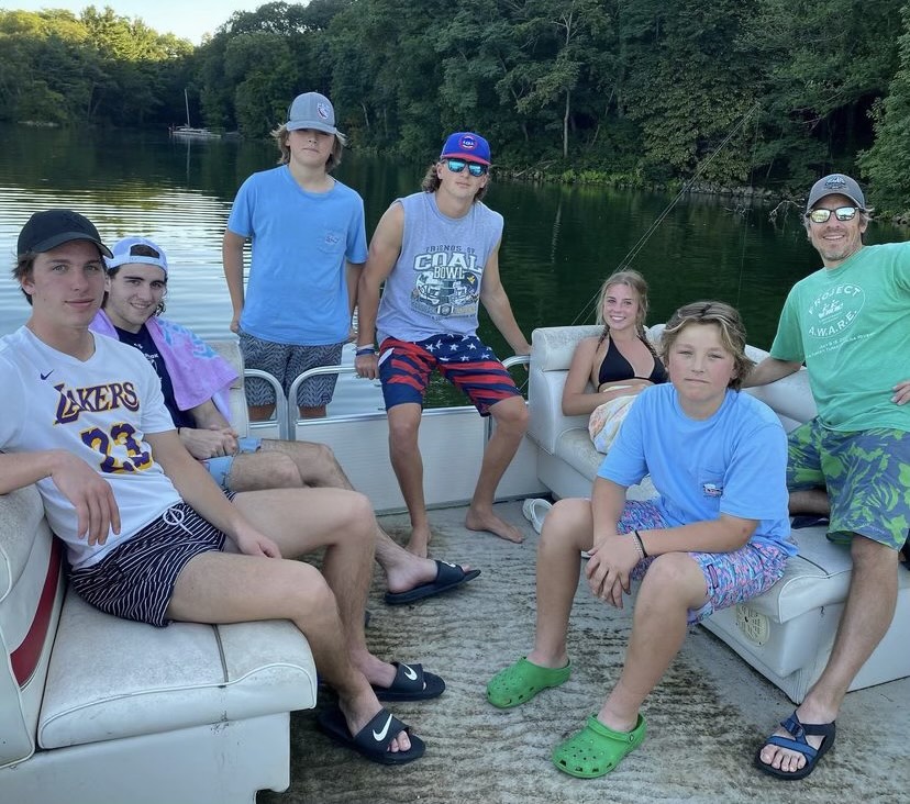 The Patton family on a boat with their new billet brothers.