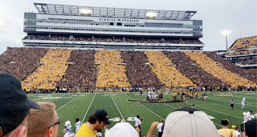 The+fans+coordinated+in+black+and+yellow+stripes+for+the+big+Penn+State+game.+