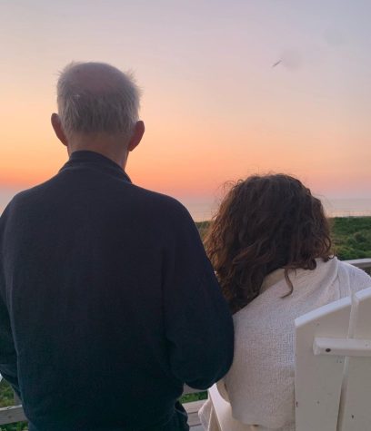 Rosie Terry and her dad watching the sunrise on their vacation to the Outer Banks.