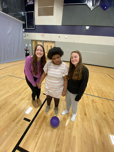 Lucy Lohman, Rylee Newland, and Alia Elgalli enjoy participating in Bolt Buddies activities. 
