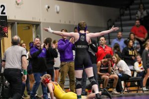 Bly celebrates her first career win at the Liberty Girl’s Invitational, hosted at Liberty on Dec. 18, 2023.