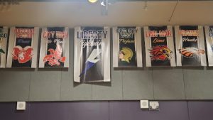 Both the cross-town rivals’ banners hang on either side of Liberty’s banner, displaying the most important competition within the conference. 