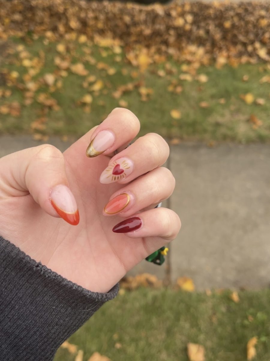 Many students have been reaching out to Prahm and Vanderpol for their nails this holiday season.