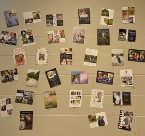 Graduation invitations proudly displayed in teachers' rooms, adding a personal touch to the upcoming celebration.