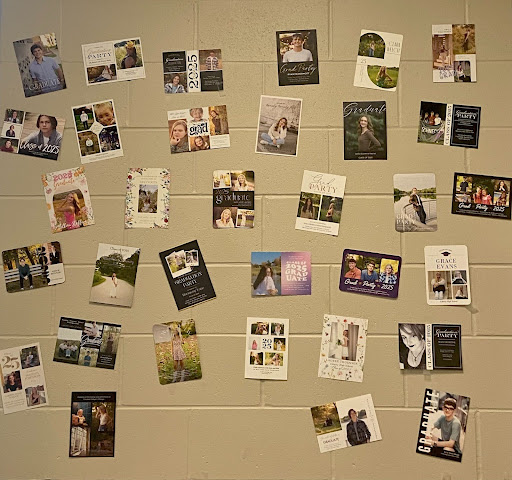 Graduation invitations proudly displayed in teachers' rooms, adding a personal touch to the upcoming celebration.