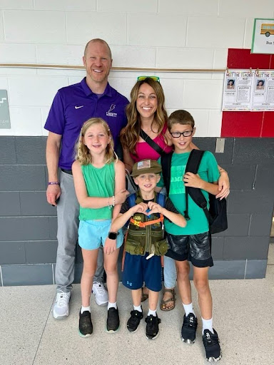 Surrounded by his family, Justin Colbert reflects on his time at Liberty and looks ahead to new opportunities at Southeast Polk. (PC: Justin Colbert)
